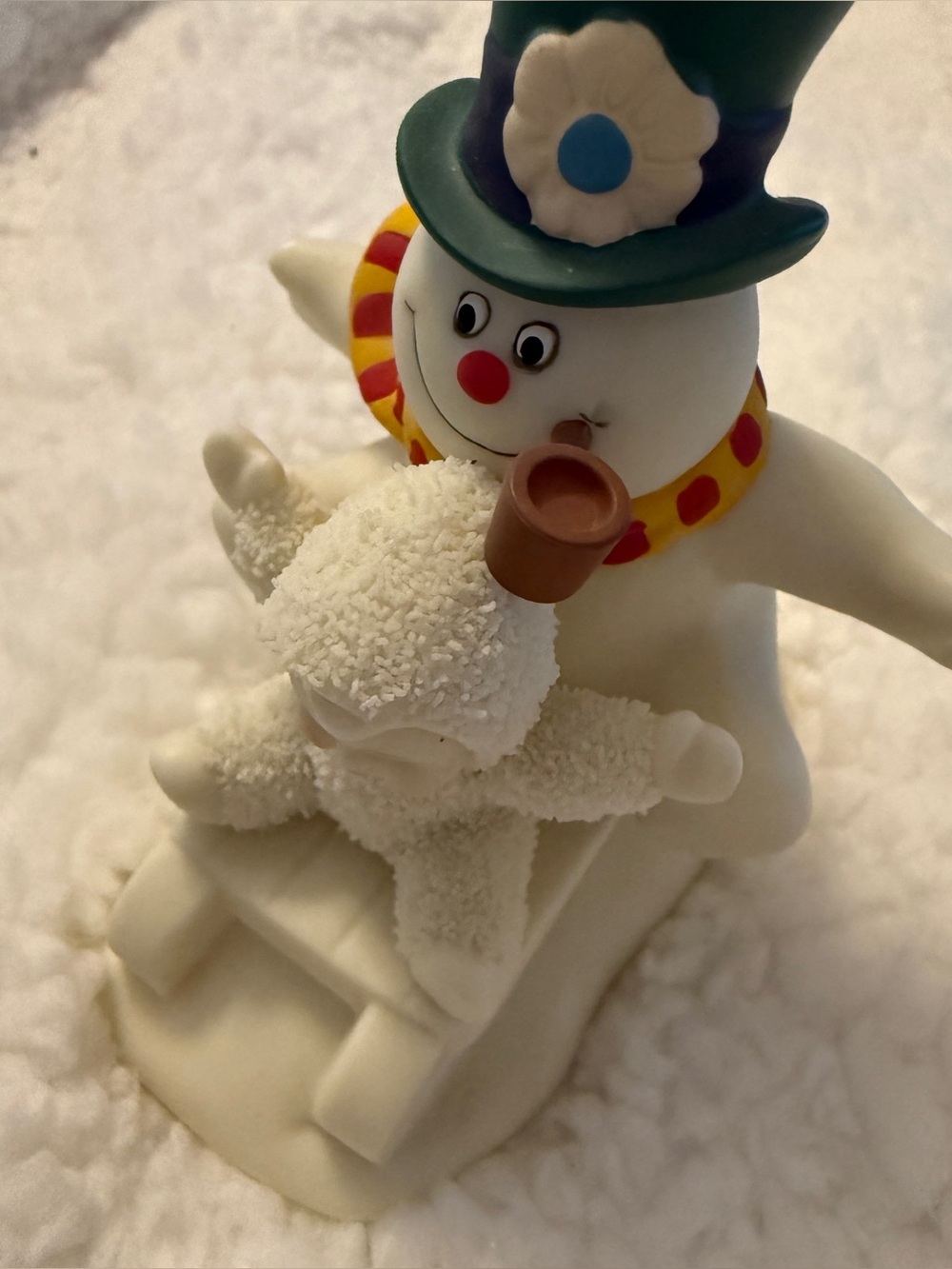 Department 56 White Snowman with Green Hat and Red-Nosed snow babies Figurine